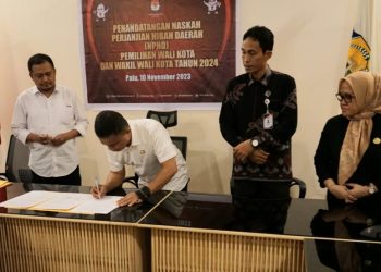 Pemkot Palu Tandatangani NPHD Bersama KPU Dan Bawaslu Kota Palu