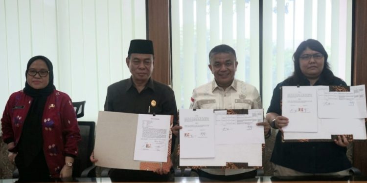 Penuhi Hak Kesehatan Masyarakat, Pemkot Palu Bersama BPJS Kesehatan Tanda Tangani MoU