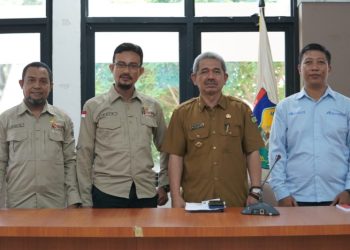 Asisten II Setda Kota Palu Membuka Sosialisasi Bela Pengadaan dan Mbizmarket