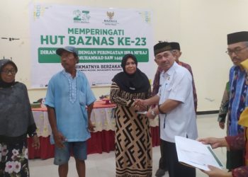 Asisten II Setda Kota Palu Hadiri Peringatan HUT Ke-23 Baznas Kota Palu, Bagikan 100 Paket Bantuan