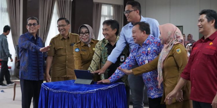 Kadis P2KB Kota Palu Hadiri Launching Sekolah Siaga Kependudukan